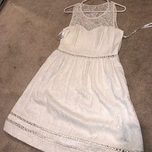 Whit formal dress with lace accents